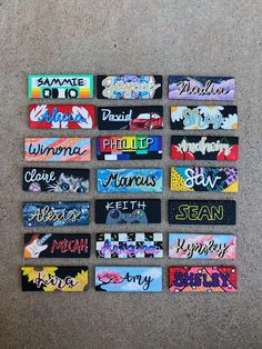 many different types of skateboard stickers on the ground with words written in them
