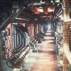 the inside of a large machine room with lots of machines on it's sides