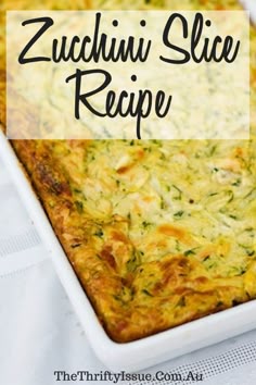 zucchini slice recipe in a casserole dish on a white tablecloth