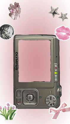 a digital camera with pink and silver decorations around it
