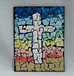 a cross painted on the side of a wall