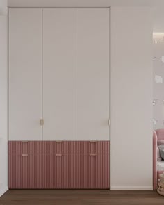 a pink and white bedroom with an armoire next to a bed in the corner