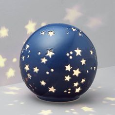 a blue ball with white stars on it
