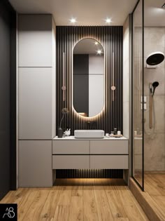 a bathroom with a sink, mirror and stand up shower in front of a wooden floor