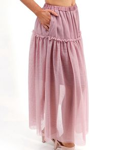 Pink Maxi Skirt Flowy, tulle perfection! The new Mesh Tiered Maxi Skirt lets you twirl your way into the new season looking as fabulous as ever! Perfect for Valentine’s Day, date nights, and spring and summer styling, this long maxi skirt features a gorgeous vintage blush pink hue that’s easy to incorporate into your G&L wardrobe, giving you a fun new look to love in the new year! Why you’ll love it: On trend, vintage blush-pink tiered maxi skirt with raw cut, ruched tulle mesh Double mesh, with soft interior lining and stretchy, comfortable, elastic waistband Functional side pockets - of course! Playful and easy, dress this flowy mesh maxi skirt up by pairing with chunky sweaters or blouses, or change up your casual look by adding a brami or graphic tee! Material: 100% polyester tulle; 10 Feminine Relaxed Maxi Skirt With Elastic Waistband, Feminine Flowy Maxi Skirt With Lined Skirt, Feminine Flowy Maxi Skirt With Elastic Waistband, Feminine Ruffled Maxi Skirt For Party, Flowy Full Skirt With Ruffles, Feminine Relaxed Fit Maxi Skirt With Elastic Waistband, Feminine Summer Maxi Skirt With Elastic Waistband, Spring Tulle Dress With Long Skirt, Flowy Pink Bottoms For Summer