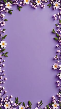 an overhead view of flowers and leaves on a purple background with space for the text