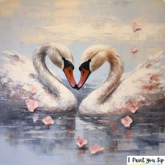 two swans in the water with their necks touching each other