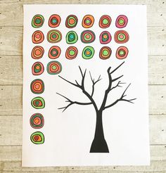 a drawing of a tree with circles on it