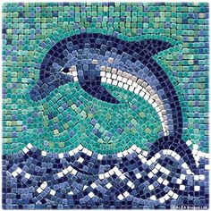 a blue and green mosaic tile wall with an image of a wave in the ocean
