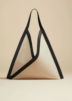 Modern Geometric Fabric Bags, Diy Geometric Bag Design, Diy Geometric Bag Inspiration, Diy Geometric Bag Sewing Pattern, Geometric Design Fashion Bags, Geometric Bag Sewing Tutorial, Triangle Tote Bag, Asymmetrical Bag Design, Origami Bag Design