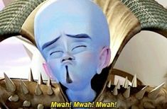 a blue man with his eyes closed and tongue out