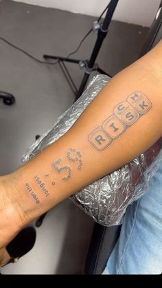 a person with a tattoo on their arm