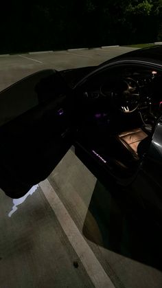 the interior of a car is shown at night