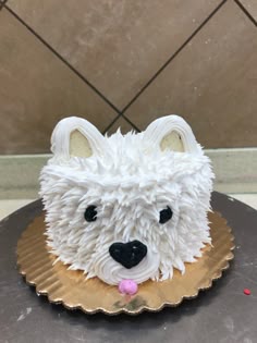 a cake shaped like a polar bear on top of a table