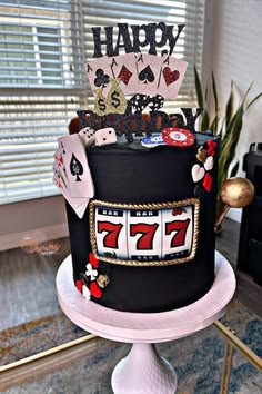 a casino themed birthday cake on top of a table