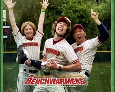 three men in baseball uniforms are posing for the camera with their arms up and hands raised