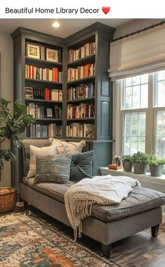 a living room filled with lots of bookshelves next to a couch and rug