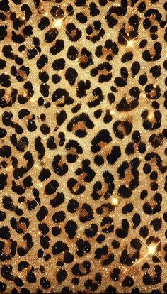 an animal print with gold glitters on it