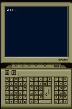 an old laptop computer sitting on top of a table