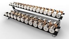 two metal racks filled with lots of different types of wheels on each side and one shelf holding several pairs of gold and silver discs