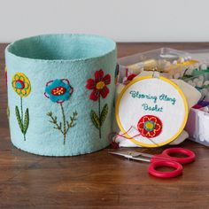 the sewing kit is sitting on the table