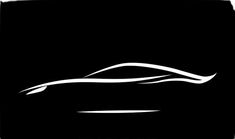 the silhouette of a car on a black background