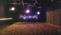an empty stage is lit up with bright lights