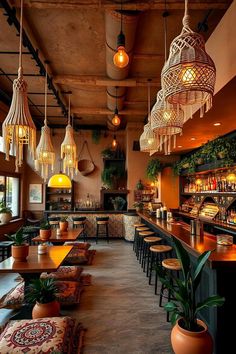 the interior of a restaurant with lots of lights hanging from the ceiling and potted plants