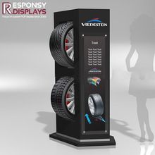 a display case with two tires on the front and one tire on the back for display