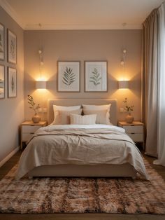 a bed sitting in a bedroom next to two lamps on either side of the bed