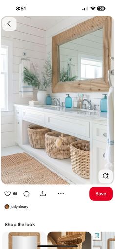 an image of a bathroom with baskets on the floor and in front of the mirror