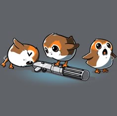 three little birds are standing next to an electronic device, which is being used as a flashlight