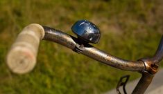 an aerial view of a bicycle handlebar with a blue helmet on it