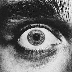 an eye is shown in black and white