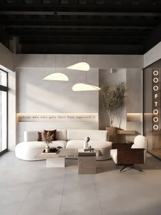 a living room filled with white furniture and lots of windows