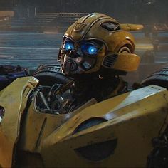 an image of a robot that is in the middle of a scene with blue eyes