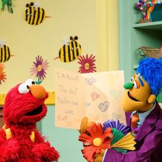 the sesame street characters are giving each other flowers and congratulationss to their loved ones