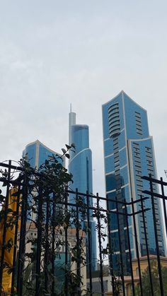 the tall buildings are next to each other in the city