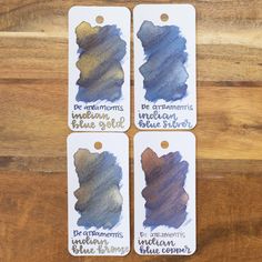 three different shades of blue and brown ink