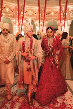 Groom Indian Wedding Outfits, Priyanka Chopra Wedding, Groom Dress Men, Indian Groom Wear, Red Bridal Dress, Bride And Groom Outfits, Latest Bridal Lehenga, Bridal Lehenga Red, Bridal Photoshoot