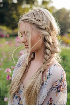 Transform your long hair into a stunning braided crown for an effortlessly chic look. This enchanting hairstyle is perfect for any occasion, adding a touch of elegance to your everyday style. It combines intricate braids that frame your face beautifully, perfect for those who love cute hairstyles. Try this whimsical updo for a romantic date night or a garden party that’s sure to turn heads!