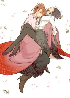 two people are laying on top of each other in the air with their arms around each other