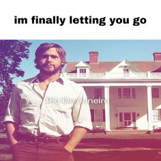 a man standing in front of a white house with the words i'm finally letting you go