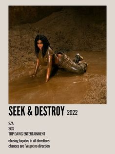 a woman laying on the ground in mud