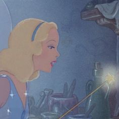 a cartoon character with a wand in her hand