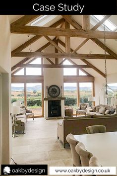 a living room filled with furniture and a large clock mounted to the side of it