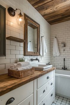 a bathroom with two sinks and a bathtub next to a mirror on the wall