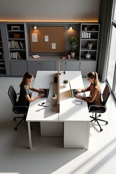 Modern couple’s home office with two facing desks, standing cabinets between them, and both individuals working calmly in sync.