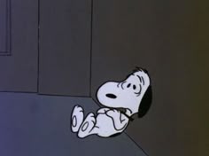 a cartoon character laying on the ground with his head down and eyes closed, in front of an open door