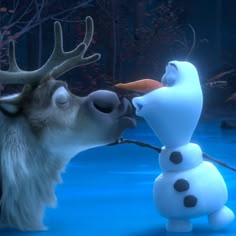 the frozen king and queen are kissing each other